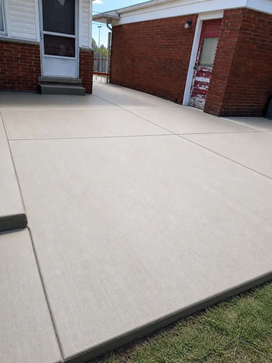 Broom-finish concrete walkway between homes in Redford, MI