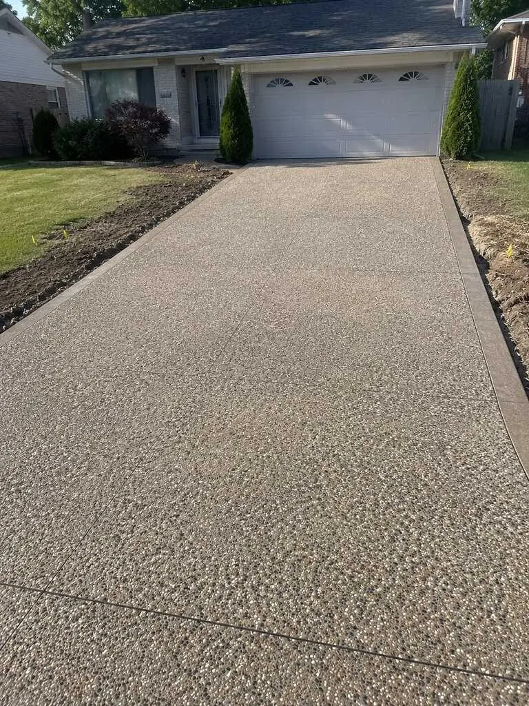 Exposed aggregate concrete driveway