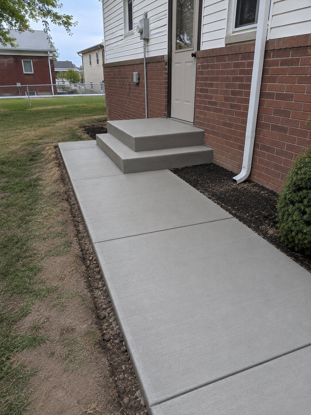 Concrete walkway with steps in Westland, MI
